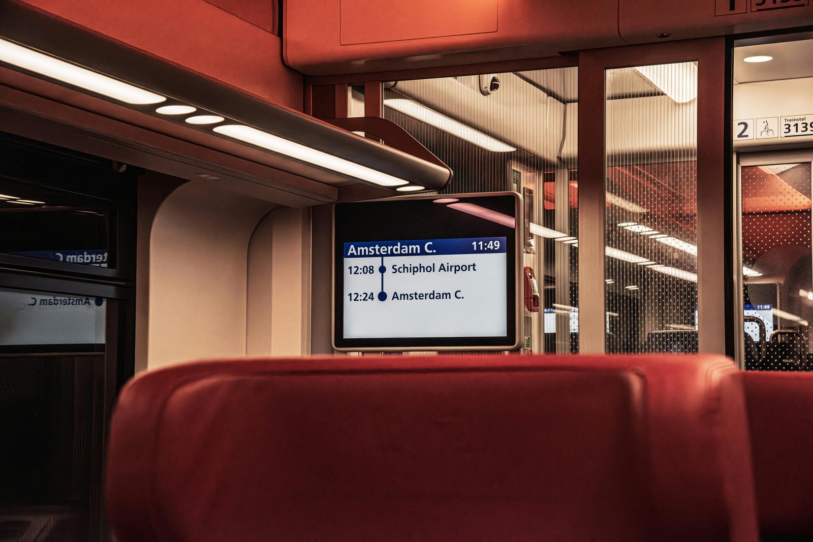 Airport metro train at modern station — Copenhagen Airport is a 13-min Metro M2 ride to Kongens Nytorv, making CPH-area hotels less necessary