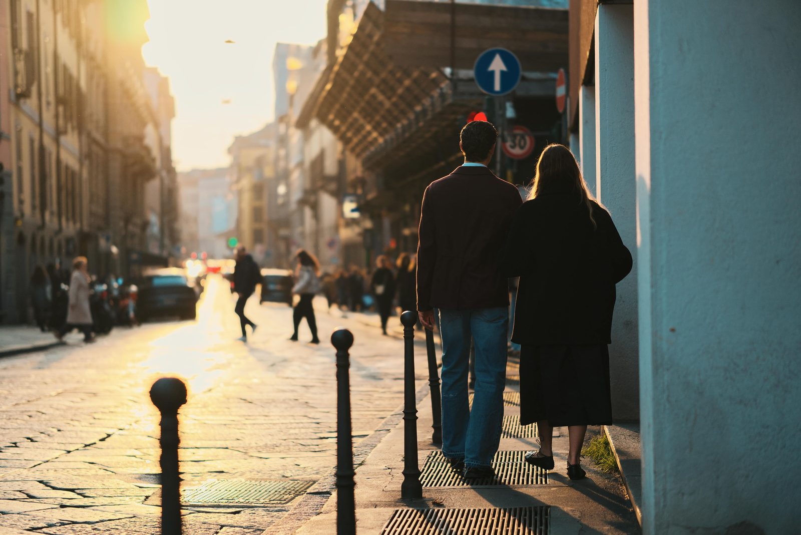 Couple walking through a European city — Copenhagen is highly walkable; most first-time itineraries don't require Metro at all