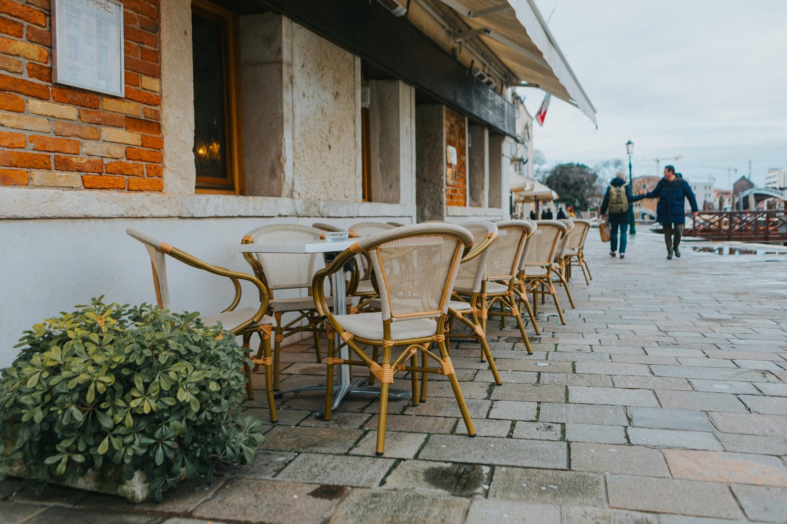 European cafe with outdoor street seating — Vesterbro is the hip alternative for first-time Copenhagen visitors who want a creative, foodie quarter